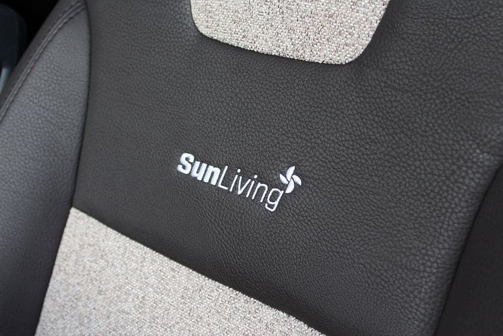 Motorhome seat with "SunLiving" logo