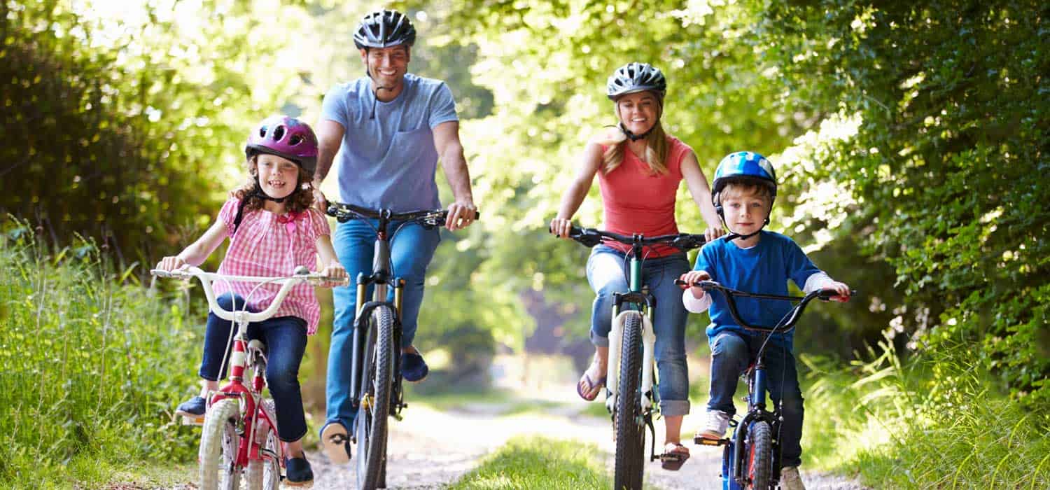 Full size image of Family all riding bikes